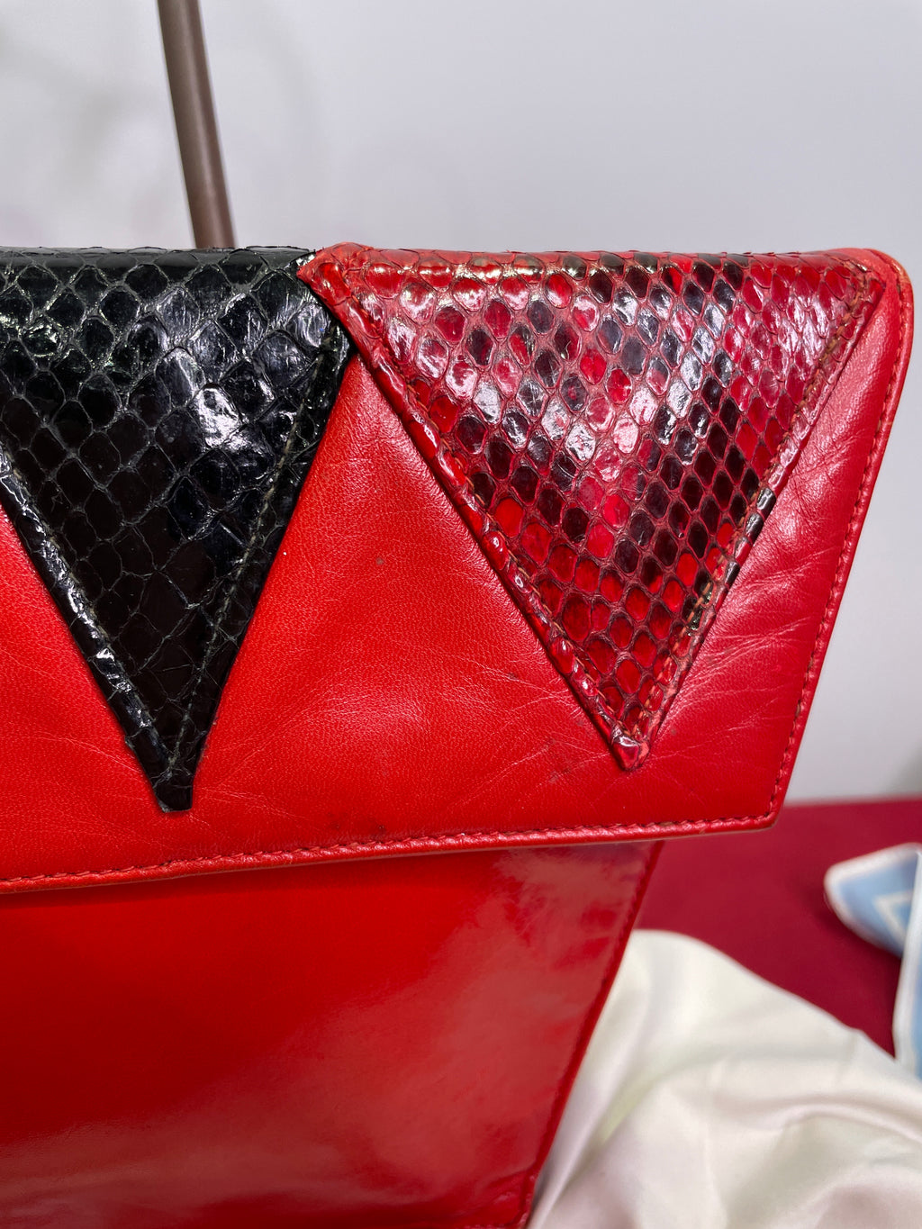 VASILIS for TROTTING Red Clutch with Snakeskin Accents